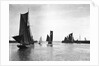 The trawler 'Roma' (1906) [LT410] with an unidentified trawler sailing out of the outer harbour at Lowestoft, Suffolk by Smiths Suitall Ltd.