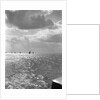 The sunlit North Sea from the harbour entrance with a number of trawlers under sail on the horizon at Lowestoft, Suffolk by Smiths Suitall Ltd.