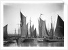 A view across Lowestoft harbour to the entrance of the trawl basin in the morning by Smiths Suitall Ltd.