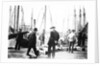 Unloading the catch in Lowestoft Harbour, with the South Pier Pavilion in the background by Smiths Suitall Ltd.