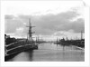 A view of the inner harbour at sunset from the harbour entrance west of the road bridge at Lowestoft, Suffolk by Smiths Suitall Ltd.