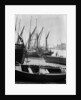 The Thames at low water with various crafts beached on the Southbank and Tower Bridge in the background. by Eagar