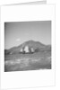 A distant starboard beam view of a Yeungkong fisher type junk under sail in Sai Wan Bay off Lyemun, Hong Kong by David Watkin Waters