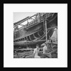 A close port side view of a Hong Kong fisher d.w. type junk repairing on a slipway at Hong Kong by David Watkin Waters