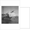 A port quarter view of an Aberdeen frame stern fisher type junk in Hong Kong harbour by David Watkin Waters