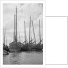 A bow view of the lorcha type junk 0667 moored between other junks at Shanghai by David Watkin Waters