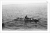 Man on a small boat by unknown