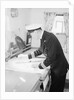 A ship's officer at the chart table of passenger liner 'Kenya' (1951) by unknown