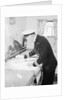 A ship's officer at the chart table of passenger liner 'Kenya' (1951) by unknown