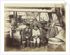 At Proven, Hans Henri, Esquimaux Dog-Driver, with his son and daughter by Thomas Mitchell