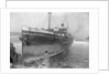 The cargo ship Archangelos (1918) with tugs in the background by Gibson & Sons of Scilly