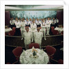 The restaurant staff on the Union-Castle cruise ship 'Windsor Castle' gather for a group photograph by Marine Photo Service