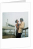 A misty evening offers amorous opportunities on deck for a romantic, smartly dressed, couple on a cruise ship by Marine Photo Service