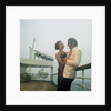 A misty evening offers amorous opportunities on deck for a romantic, smartly dressed, couple on a cruise ship by Marine Photo Service