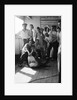 A group of off-duty crew from 'Carinthia' (1925) pose with a captured shark on deck by Marine Photo Service