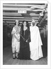 Passengers dress up in Middle Eastern costume for an obscure tableau aboard an unspecified cruise ship by Marine Photo Service