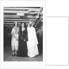 Passengers dress up in Middle Eastern costume for an obscure tableau aboard an unspecified cruise ship by Marine Photo Service