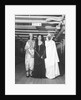 Passengers dress up in Middle Eastern costume for an obscure tableau aboard an unspecified cruise ship by Marine Photo Service