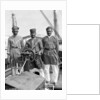 Three Lascars of the 'Viceroy of India' (1929), standing behind the wheel of one of the ship's tenders by Marine Photo Service