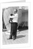 Steward with ship's cat by Marine Photo Service