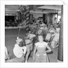 Three children in the "Apple Eating" contest, possibly in the ballroom of the 'Chusan' (1950) by Marine Photo Service