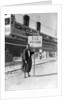 A Tunisian tour guide posing with his official P & O sign, Bizerte, Tunisia by Marine Photo Service