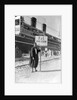 A Tunisian tour guide posing with his official P & O sign, Bizerte, Tunisia by Marine Photo Service