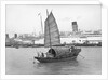 A junk in Hong Kong harbour, 1933 by Marine Photo Service