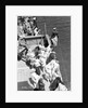 A sailor takes a sounding as the ship approaches the Greek island of Santorini by Marine Photo Service