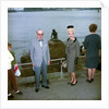Unidentified couple posing in front of the Mermaid sculpture, Copenhagen, Denmark by Marine Photo Service
