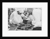 Pearl buyers examining pearls by Alan Villiers