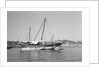 A large baggala in Mutrah harbour by Alan Villiers