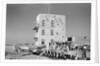 Three-storey building and boatyard, Jizan by Alan Villiers