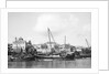 Booms anchored along the waterfront at Mombasa, Kenya by Alan Villiers