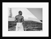 A sailor of the 'Sheikh Mansur' keeps and eye on the sail by Alan Villiers