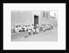 Sailors relaxing outside a merchant's house by Alan Villiers