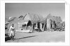 Jizan market with 'ushshah' houses by Alan Villiers