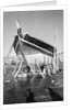 A zarook undertaking repairs on Ma'alla beach by Alan Villiers