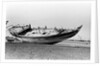 Decorated stern and deck hull of a large sambuk, beached at Aden by Alan Villiers