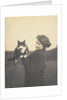 An informal photograph of Kathleen Alice Taylor holding Slabbie the black/white cat in her hands by Unknown
