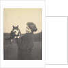 An informal photograph of Kathleen Alice Taylor holding Slabbie the black/white cat in her hands by Unknown