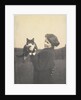An informal photograph of Kathleen Alice Taylor holding Slabbie the black/white cat in her hands by Unknown