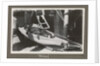 Service career of Lieutenant V. N. Surtees 1926-8 in HMS 'Emerald' (1920). 'Nelson' monkey in hammock, page 171 by Lieutenant V. N. Surtees