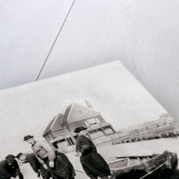 Men and boys in traditional costume by a canal bank, Marken Island, Netherlands by James Batkin