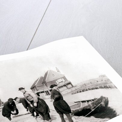 Men and boys in traditional costume by a canal bank, Marken Island, Netherlands by James Batkin