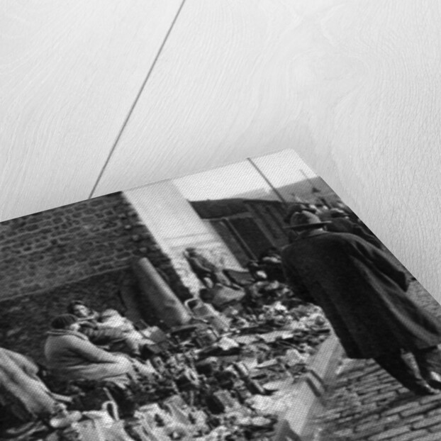 A display of goods at the flea market, Paris by Ernest Flammarion