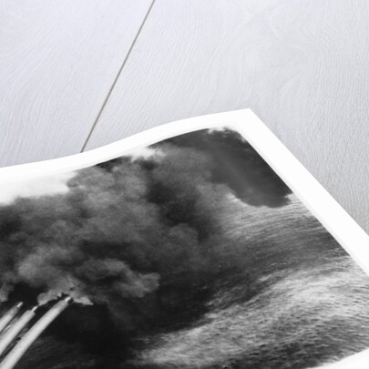 The guns of the battleship HMS Nelson firing by Anonymous