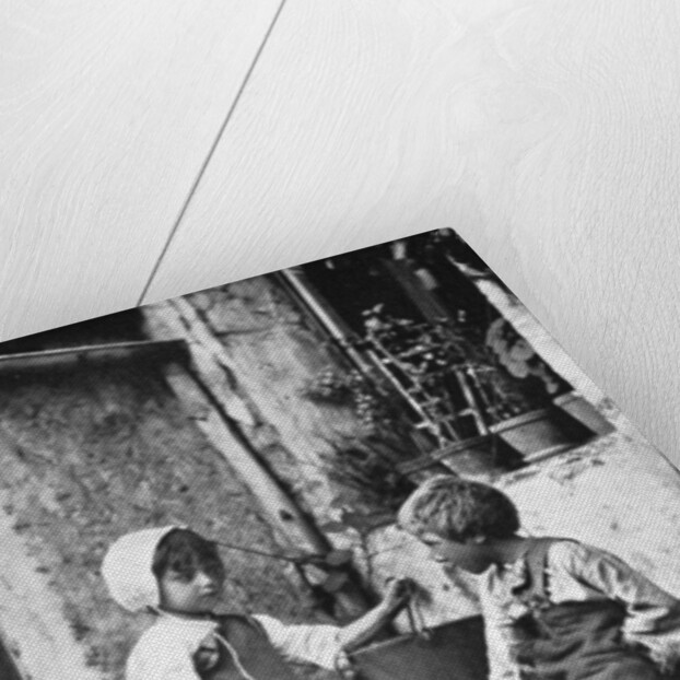 Two children in a backyard by Constance Ellis
