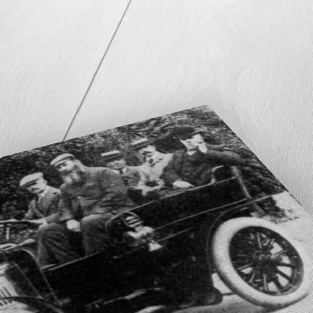 Five men sitting in a motor car by Anonymous