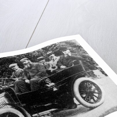 Five men sitting in a motor car by Anonymous